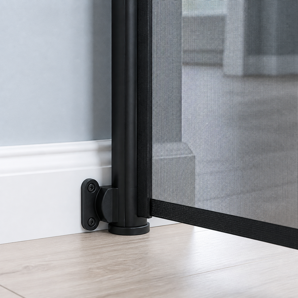 Close view of the retractable pet gate wall mount aligned over a baseboard View 15