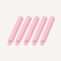 Five pink food bag sealing clips View 1